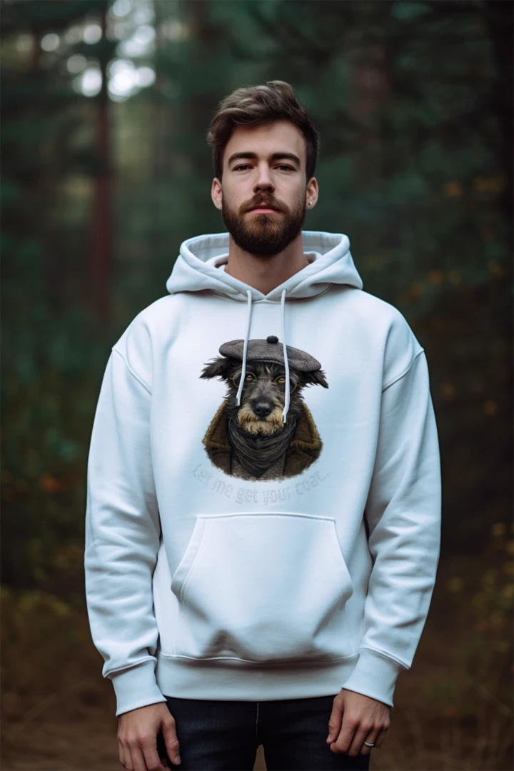 Man wearing a white hoodie with colorful graphic design in a forest setting